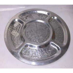 Silver serving tray that spins- many details etched in each segment - very nice